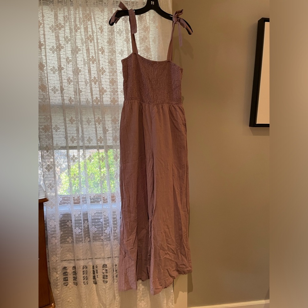 Mauve color smocked jumpsuit with shoulder ties. Sz. L